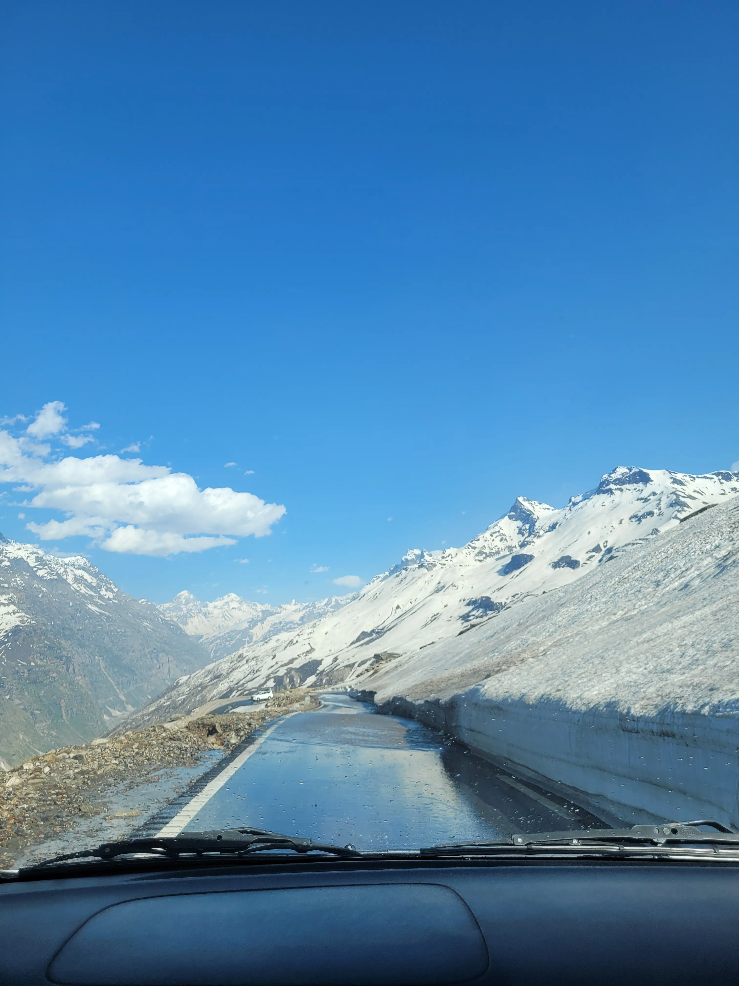 Snow peaks from a car window